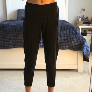 Black athletic pants, cropped